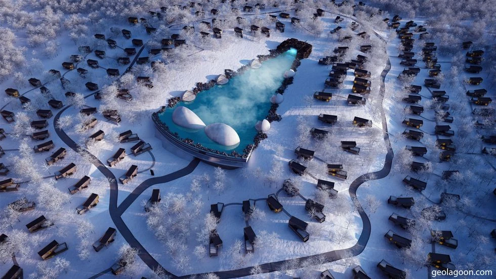 An aerial view of the lagoon and the cottages.