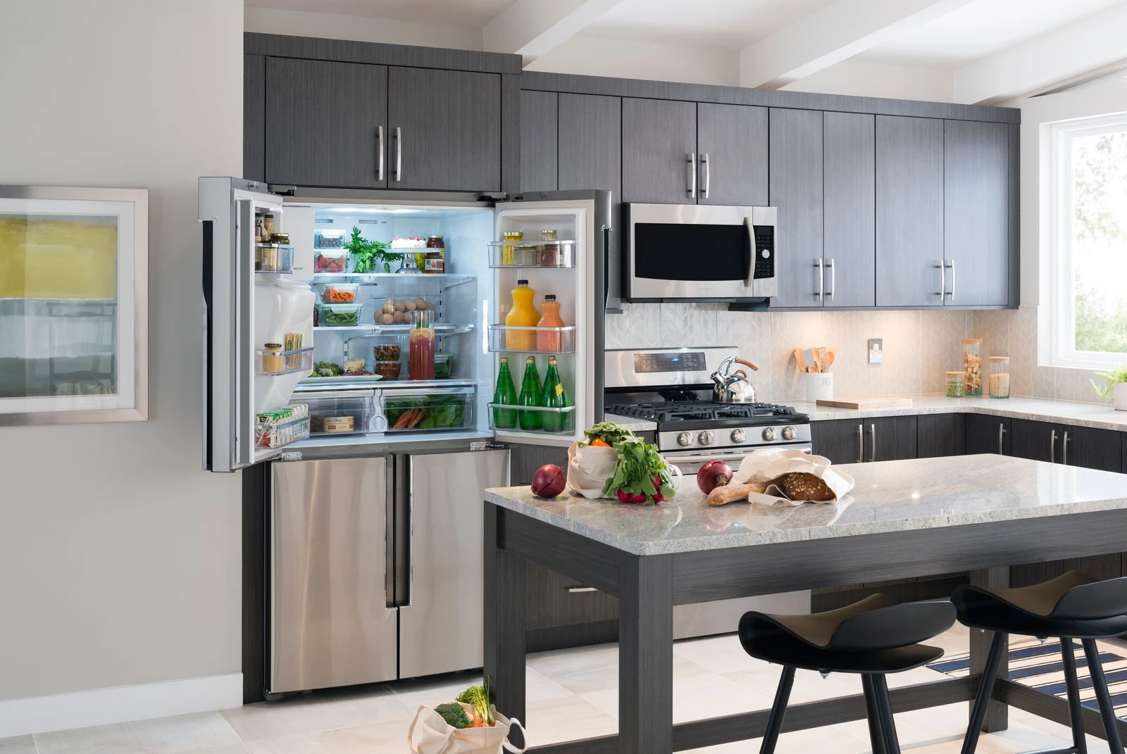 Image may contain Interior Bedroom Furniture Chair Kitchen Island Oven Microwave Appliance Interior Design and Kitchen