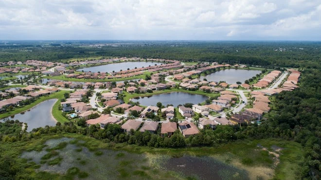 Millstone Landing, located across from the less developed DR Horton development, Millstone South, is seen in an aerial photo taken by a drone August 13, 2019, in Indian River County.