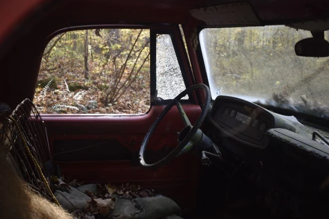 It's been a while since anyone's been behind the wheel of this old truck, and it shows.