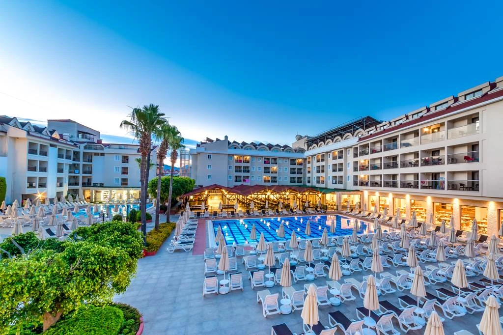 The Julian Club Hotel has four outdoor pools and is located less than a mile from the beach